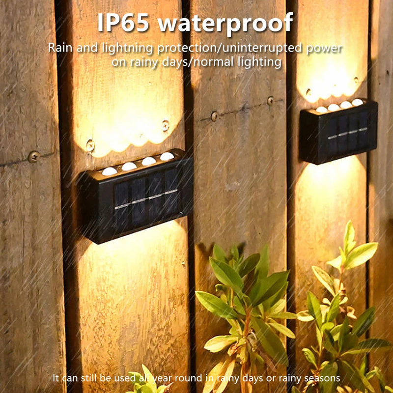 10-LED outdoor wall light creating a symmetrical up-and-down lighting effect after dark