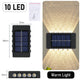 Une applique murale extérieure à 10 LED en lumière chaude avec éclairage décoratif vers le haut et le bas