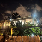 6000-lumen solar outdoor light demonstrating broad nighttime coverage across a large yard, driveway or open garden area