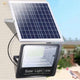 Foco solar LED exterior montado en pared con panel solar separado y control remoto