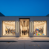 American retail storefront with LED wall lights at evening