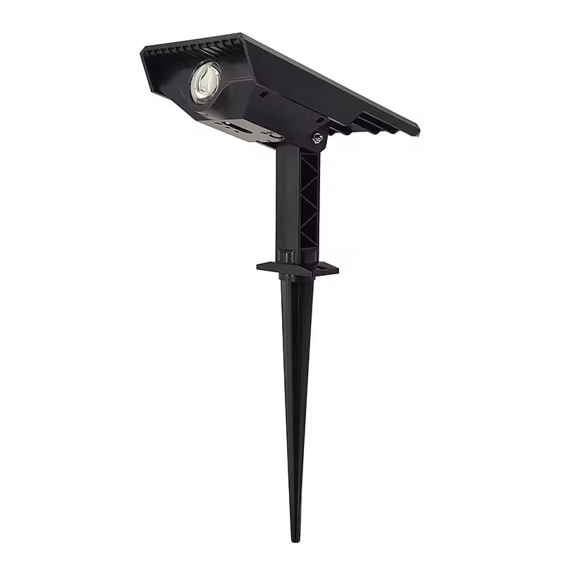 Black high-power solar tree light with integrated solar panel, adjustable spotlight head and long ground stake on a white background