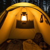 Rechargeable camping lantern demonstrating adjustable warm-to-cool white color temperatures for different indoor and outdoor uses