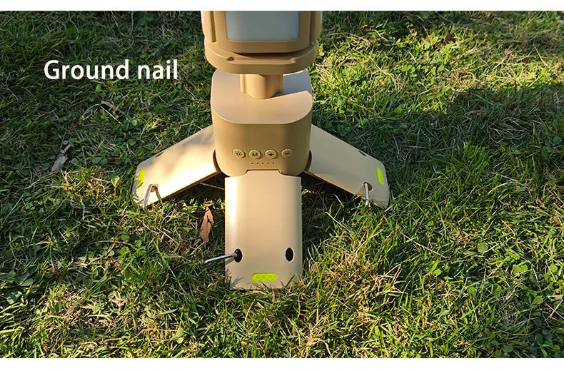 Close-up of the rechargeable camping lantern base showing control buttons, charging ports and rugged outdoor construction