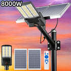 Sistema de foco solar comercial con dos paneles solares y gran lámpara LED para iluminación exterior de alta potencia