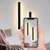 Dimmable outdoor wall light feature graphic highlighting adjustable illumination from the long LED strip fixture