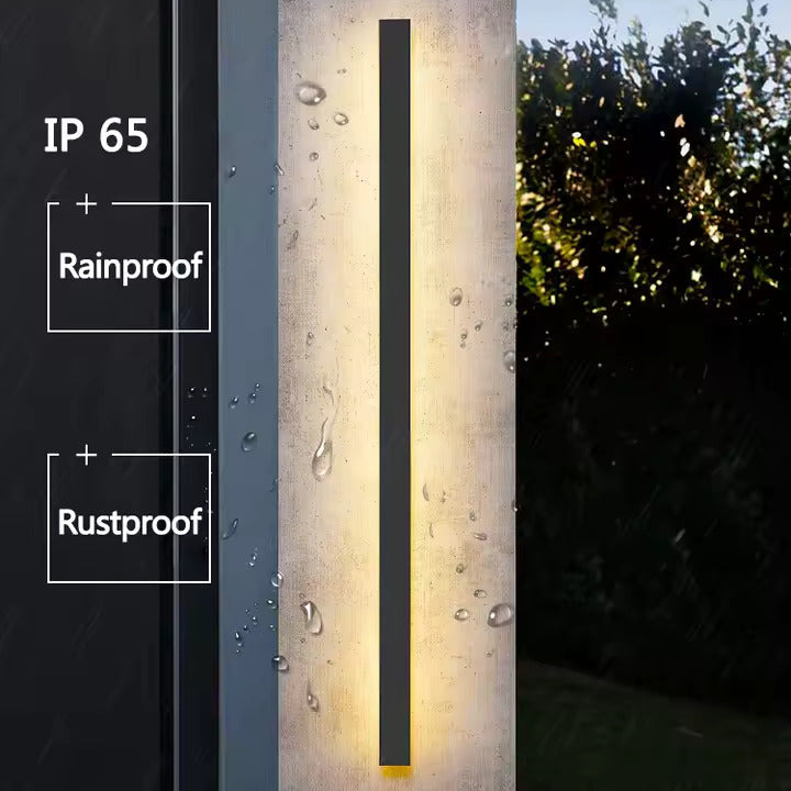 Modern long-strip outdoor LED wall light with a slim black housing for architectural exterior lighting