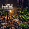 IP54 waterproof high-power solar tree light operating in heavy rain among garden rocks and plants for all-weather outdoor lighting
