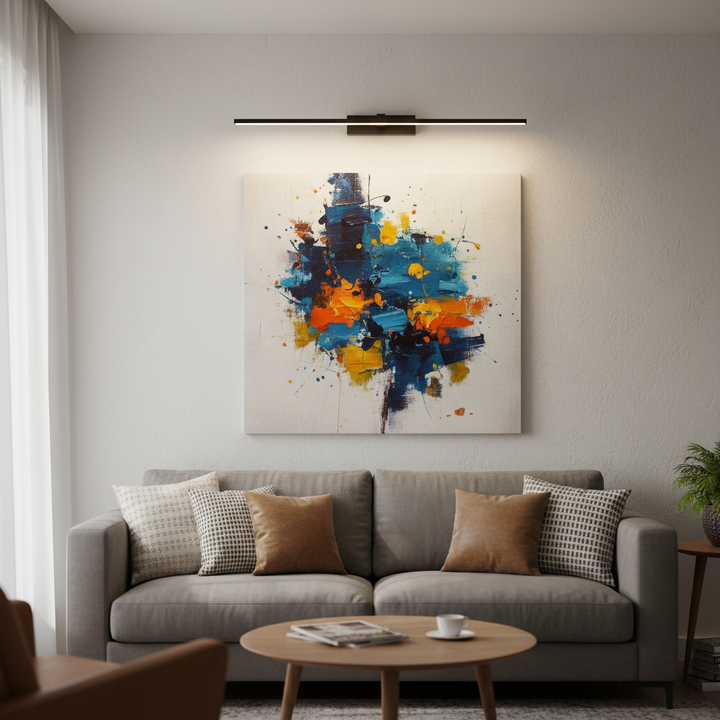 LED wall light above artwork in living room | NoxLumin
