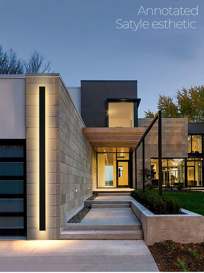 Linear outdoor LED wall light installation detail showing the mounting base and elongated fixture body