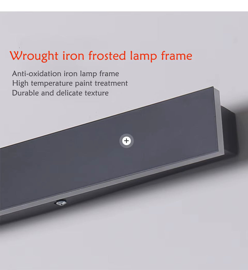 Long linear LED wall light creating bright vertical architectural illumination on a modern exterior wall at night