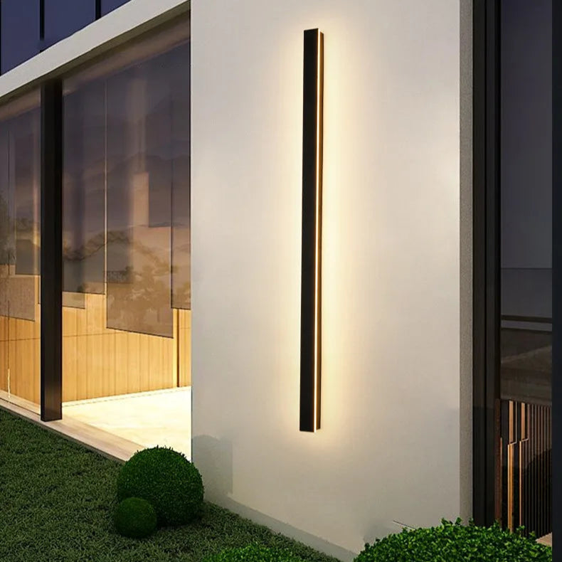 Linear outdoor wall light shown for architectural lighting on homes, patios, garages and commercial exterior walls