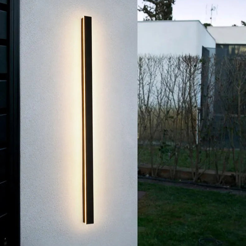 Weather-resistant long-strip LED wall light designed for exterior use in rain and changing outdoor conditions