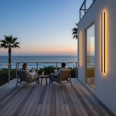 Modern American beach house deck with LED wall light at twilight