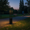 Modern bollard light in public park pathway