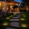 NoxLumin solar pathway lights illuminating a backyard garden path with stepping stones, pergola patio, and warm evening outdoor lighting