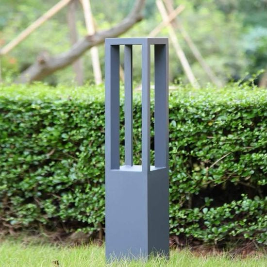 Close product view of a modern black LED bollard light showing the slim aluminum body and downward light opening
