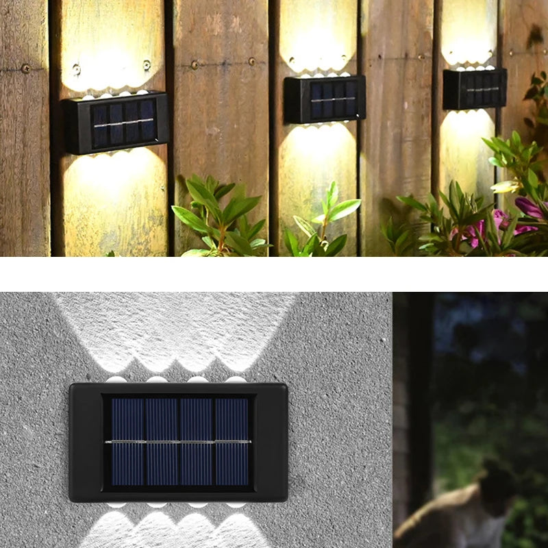 Outdoor LED wall light demonstrating decorative upward and downward beam patterns on an exterior wall