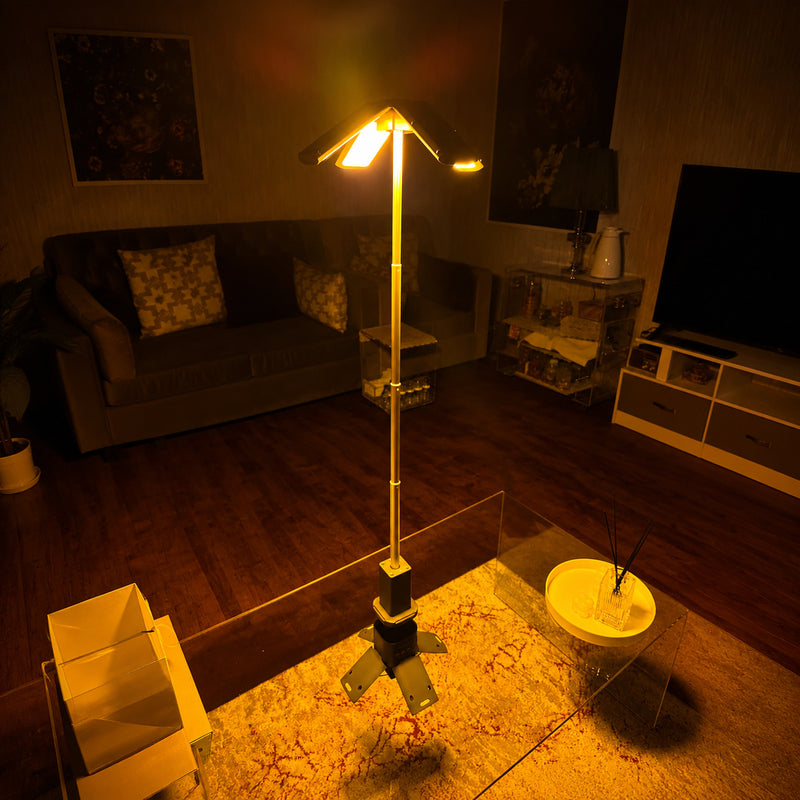 High-output rechargeable camping lantern fully extended to illuminate a room during a power outage