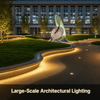 Warm-white solar COB LED strip lighting illuminating curved pathways outside a large modern commercial building