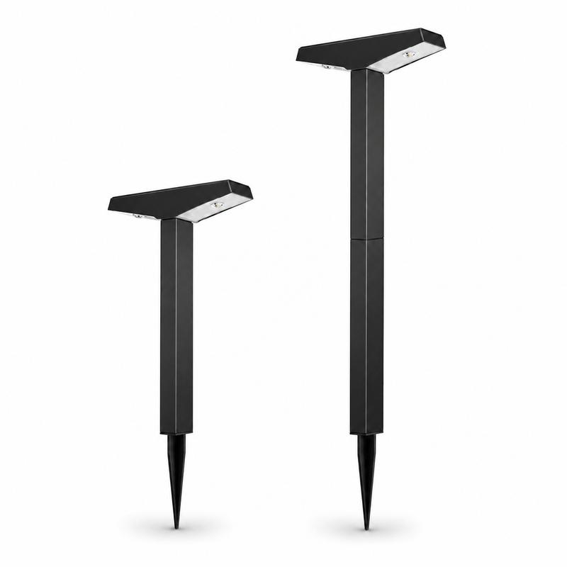 Black solar pathway light with a modern cap and ground stake shown as an outdoor accent light for gardens and walkways
