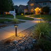 Solar pathway lights in front yard landscape design