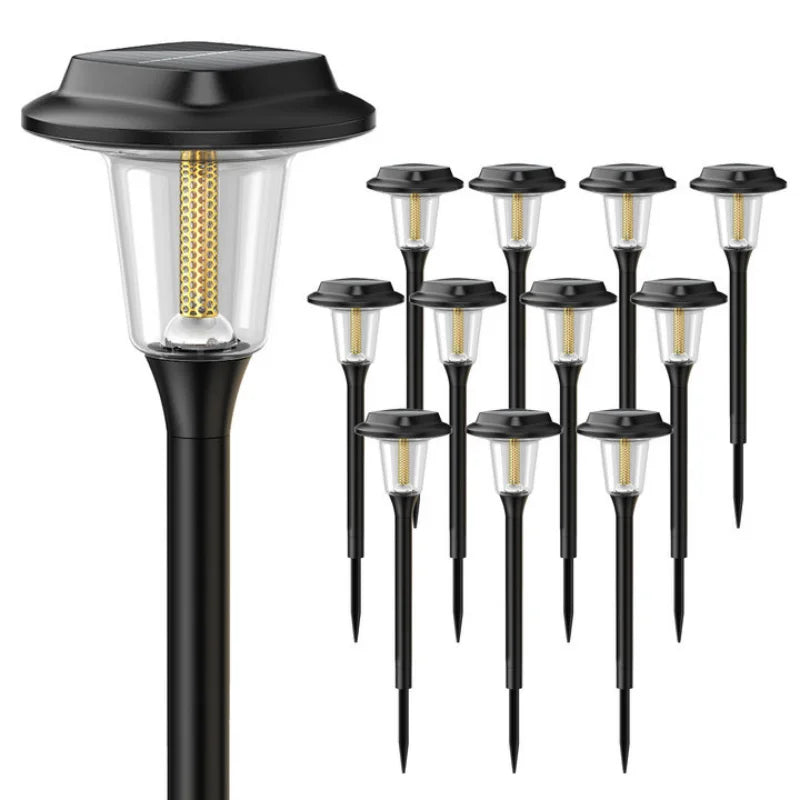 Varias luces solares de camino en conjunto para bordear senderos, césped y límites del jardín