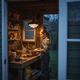 Solar pendant light illuminating a potting shed workbench without hardwired power