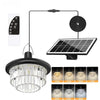 Split solar pendant light shown with remote control for adjusting brightness, color temperature and timer settings