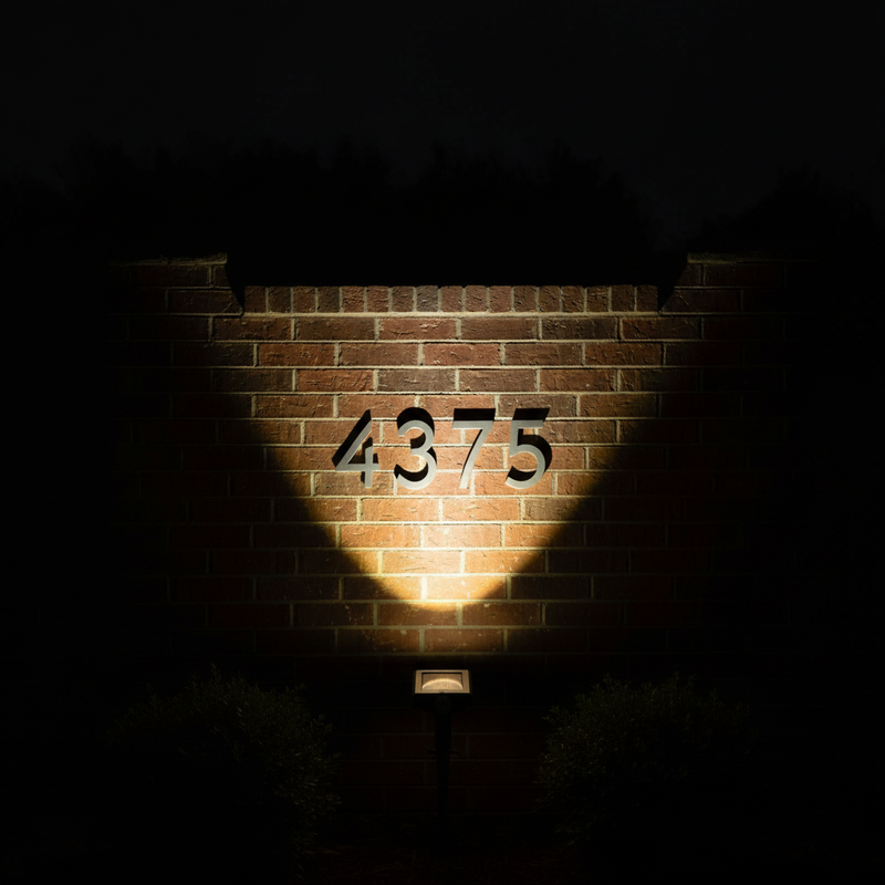 Solar spotlight as sole light source illuminating house numbers at night | NoxLumin