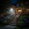 Outdoor LED solar spotlight with a separate solar panel for flexible placement in gardens, yards and landscape areas
